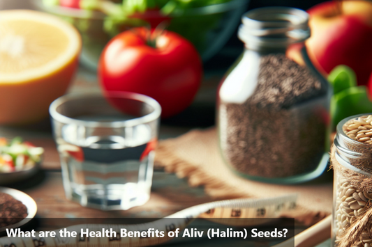 A close-up image of a wooden table displaying a glass of water, a measuring tape, and jars filled with aliv seeds, tomatoes, and oranges in the background.