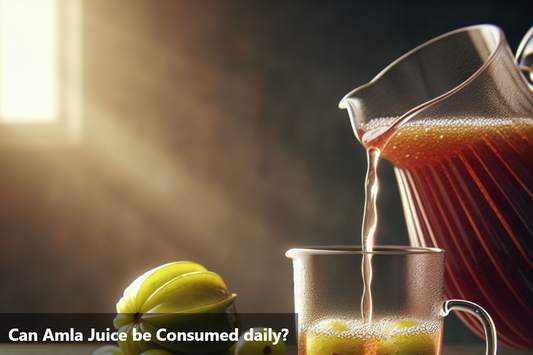 A glass of amla juice being poured from a pitcher, with amla fruits on the side.