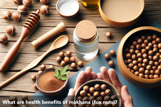 A hand holding a bowl of makhana (fox nuts) with other bowls and ingredients on a wooden table.