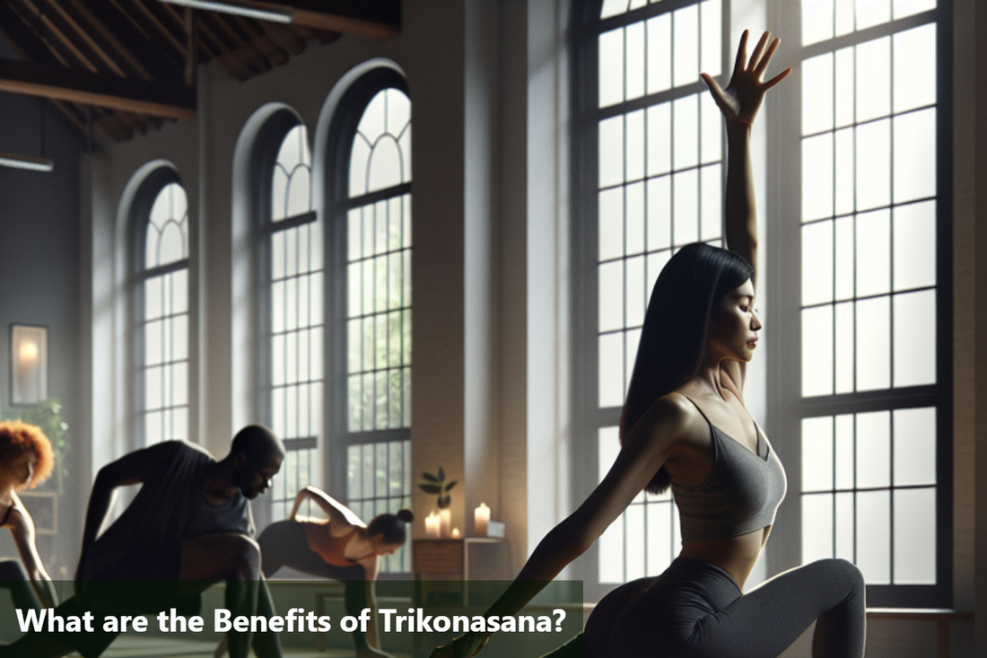 A woman practicing Trikonasana (Triangle Pose) in a yoga studio, with two other people in the background.