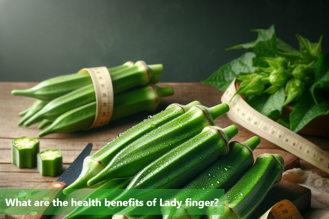 A close-up image of fresh lady fingers on a wooden table.