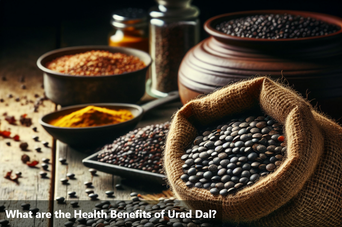 A burlap sack of urad dal lentils spilling onto a wooden table, with other spices and ingredients in the background.