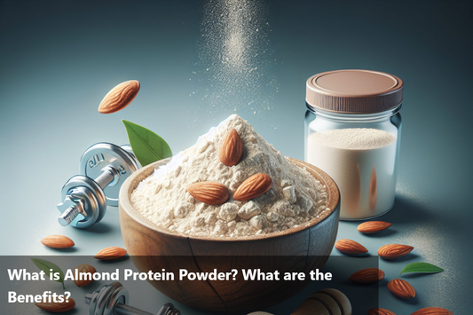 A wooden bowl filled with almond protein powder and almonds next to a glass jar of almond protein powder and a dumbbell.